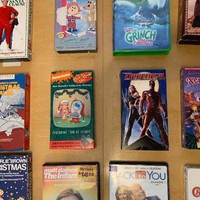 Assortment of 10 VHS Tapes and 2 DVDâ€™s