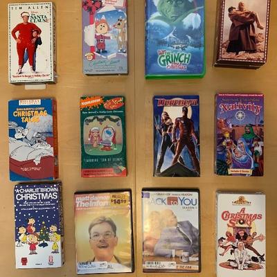 Assortment of 10 VHS Tapes and 2 DVDâ€™s