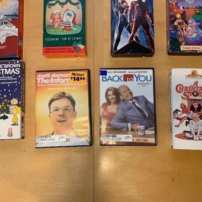 Assortment of 10 VHS Tapes and 2 DVDâ€™s