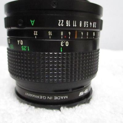 Lot 31 - Canon FD 24mm 1:2.8 Lens With B + W Filter