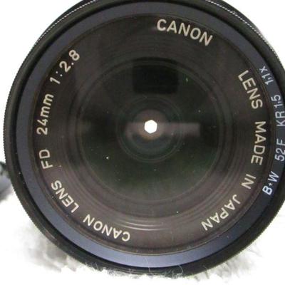 Lot 31 - Canon FD 24mm 1:2.8 Lens With B + W Filter