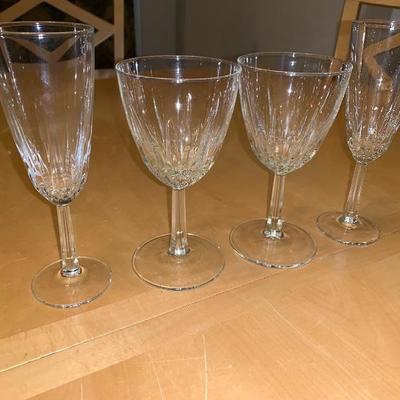 Assortment of Items Wine Glasses Teacup And Saucer