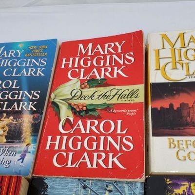 11 Paperback Books: 3 Mary Higgins Clark, 3 Sara Paretsky, and 5 Julie Smith