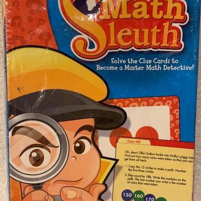 Math Sleuth Ages 7+ (See both photos for info on this item)  Lots of fun learning math - NEW