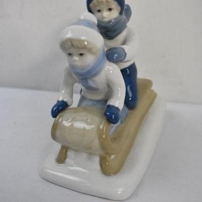 Porcelain Figurine - 2 Kids on a Snow Sled - 1992