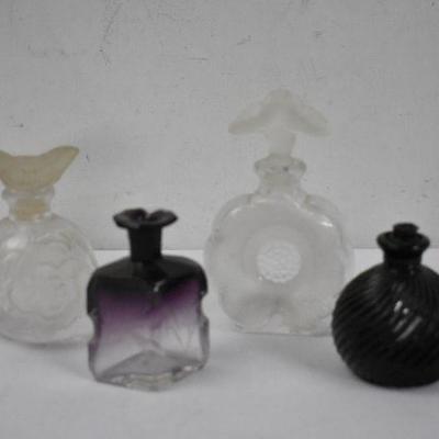 4 Small Glass Perfume Bottles: 2 Clear, 1 clear/purple, 1 black