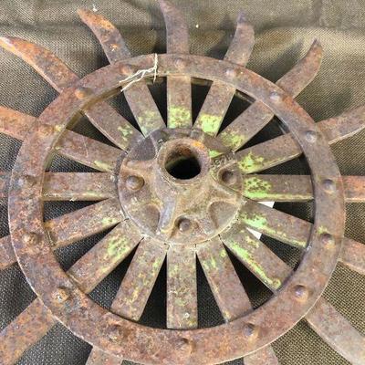 Lot #87  Cultivator Wheel #2 Antique John Deer