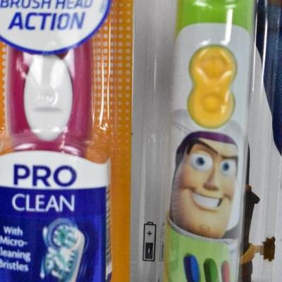 2 Battery Powered Toothbrushes: Pink Spinbrush & Toy Story Buzz Lightyear - New