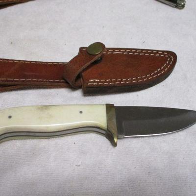 Lot 75 - Knife With White Handle 1 Of 3 