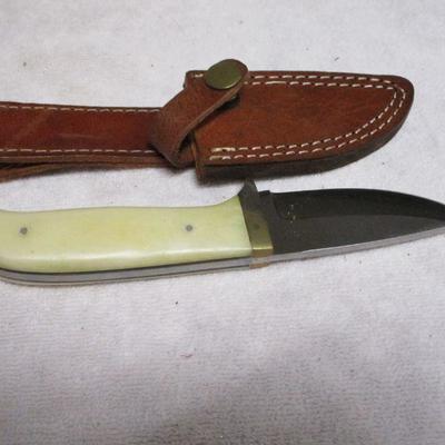 Lot 75 - Knife With White Handle 2 Of 3