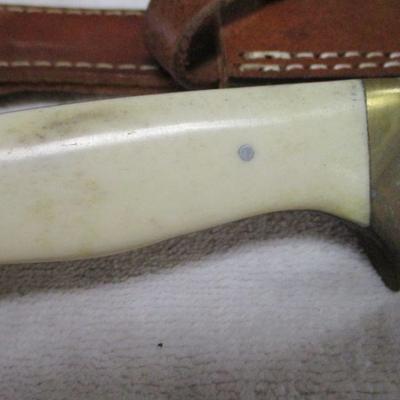 Lot 75 - Knife With White Handle 2 Of 3