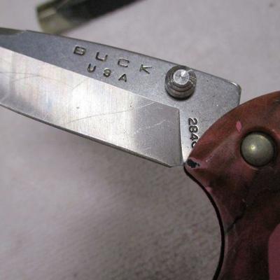 Lot 81 - Buck USA Pocket Knives