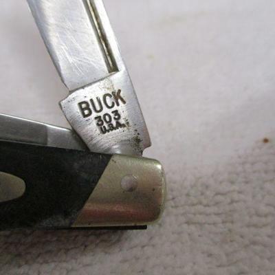 Lot 81 - Buck USA Pocket Knives