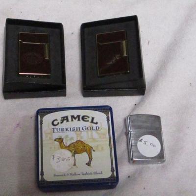 Lot 104 - Lighters & Empty Camel Tin