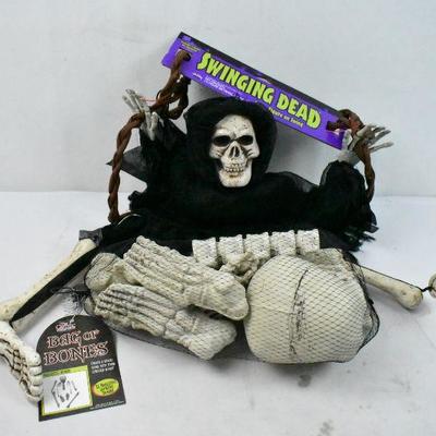 2 Piece Halloween Decor: 3 Feet Swinging Dead and Bag of Bones
