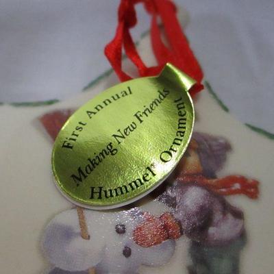 Lot 38 - M.J. Hummel & Danbury Mint “2005 Making New Friends” Porcelain Ornament 1 of 2