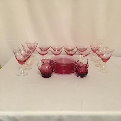 Lot 44 - Pink Stemware & Plates