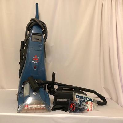 Lot 90- Oreck XL Vacuum with Bissel Pro Heat Plus