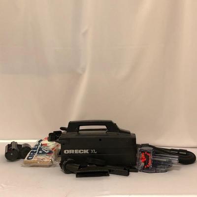 Lot 90- Oreck XL Vacuum with Bissel Pro Heat Plus