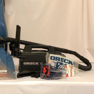 Lot 90- Oreck XL Vacuum with Bissel Pro Heat Plus