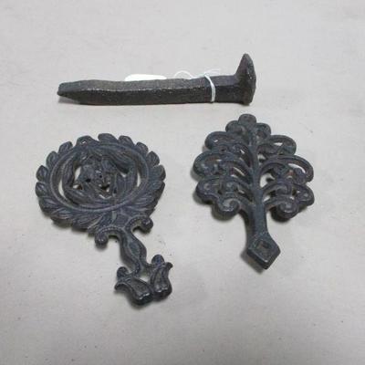 Lot 172 - Griswold Cast Iron Trivets