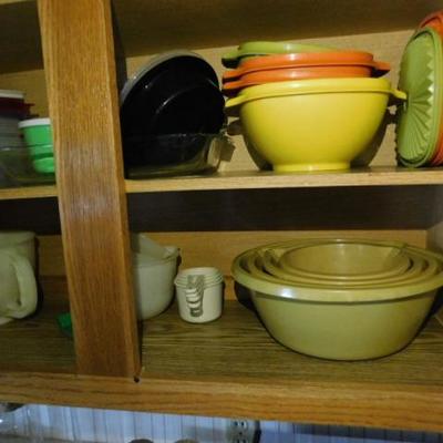 Cabinet Full of Tupperware Storage and Kitchen Help Items