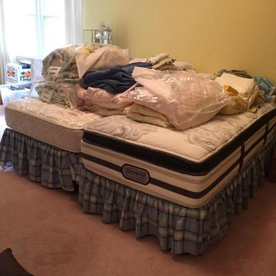 Lot 130 - Pair Twin Bed Frames And Bedding