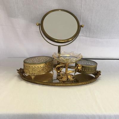 Lot 167 - Brass Vanity Array