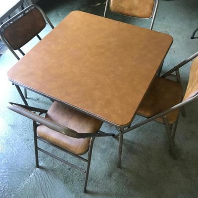 Lot # 131 golden vinyl card table with four chairs 