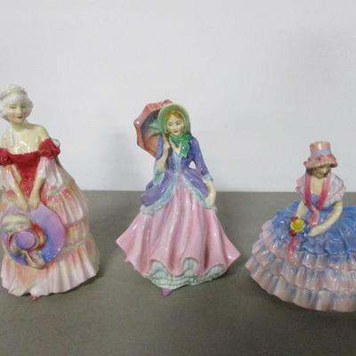 Lot 16 - Royal Doulton "Southern Belle" Porcelain Figures