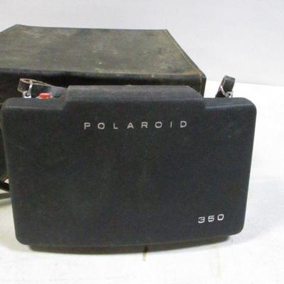 Lot 86 - Model 350 Polaroid Camera & Accessories 