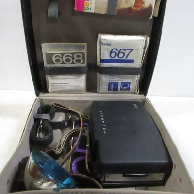 Lot 86 - Model 350 Polaroid Camera & Accessories 