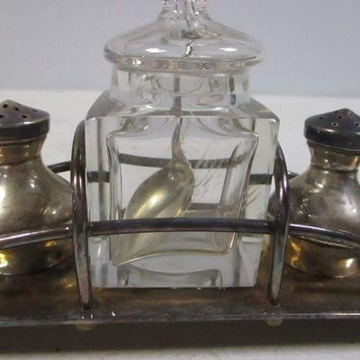 Lot 92 - Sterling Shakers & Spoon