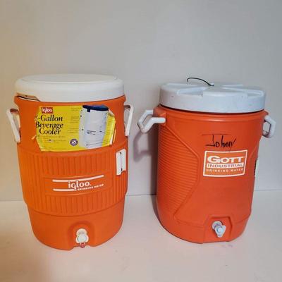 2 Orange 5 Gallon Water Coolers