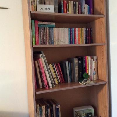 Lot # 21. Bookcase with books