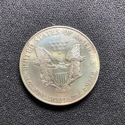 Lot 36 -  .999% Pure Silver American Eagle 1998 Coin