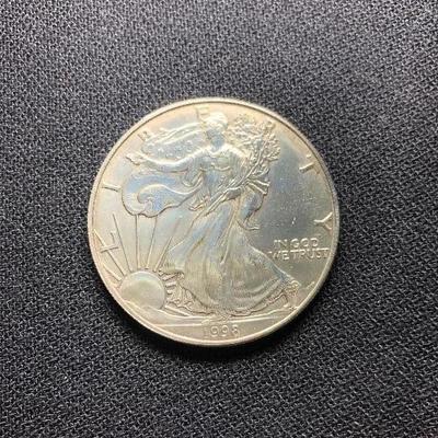 Lot 36 -  .999% Pure Silver American Eagle 1998 Coin