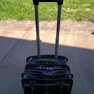 Wilson Leather rolling Briefcase 