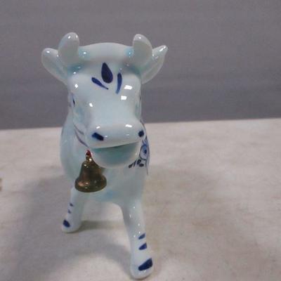 Lot 173 - Holland Cow Creamer & Royal Worcester Egg Coddlers