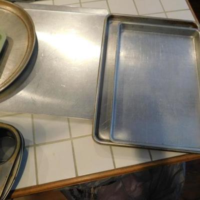 Large Collection of Baking Sheets and Muffin Pans