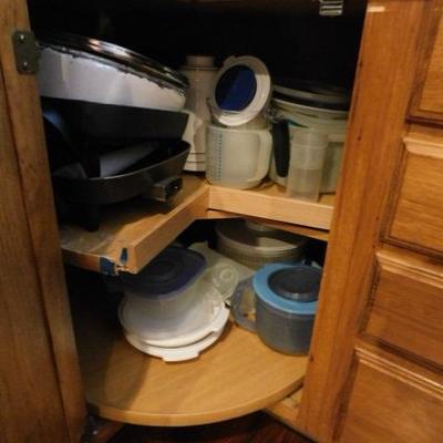 Collection of Plastic Containers and Assorted Kitchen Items