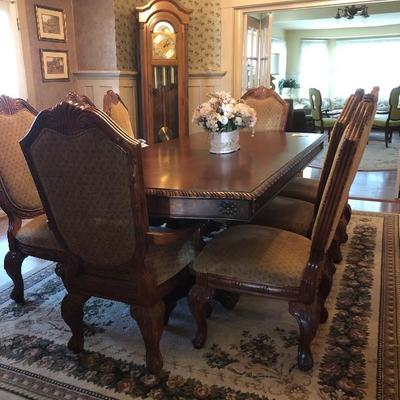 Fancy dining table with EIGHT CHAIRS SOLD RUG AVAILABLE 