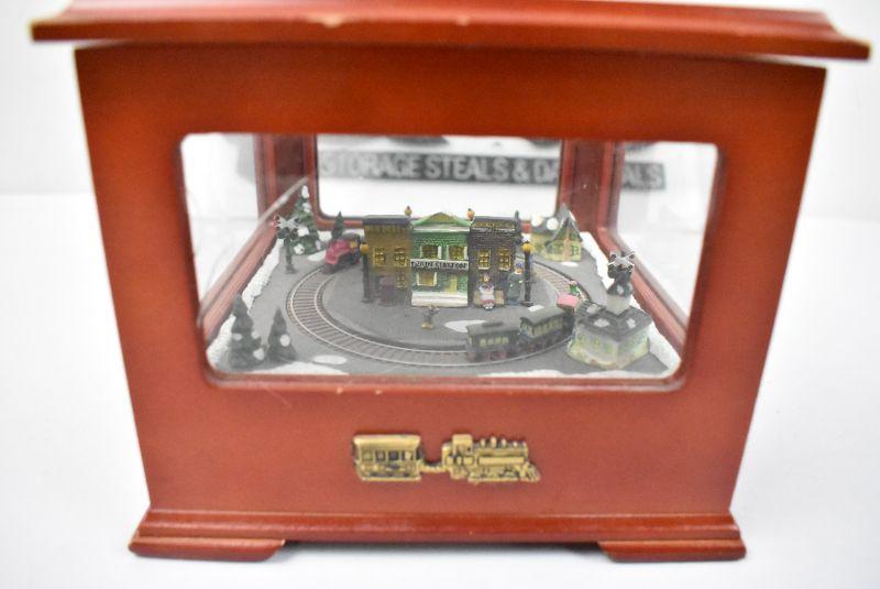 Mr. Christmas Music Box Train Rotates Around Village Works