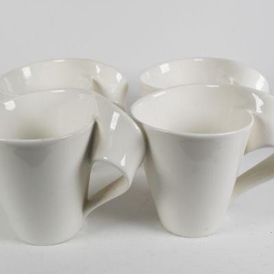 Lot 39- Set of Unique Mugs