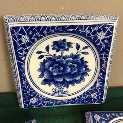 Lot #106 5 plant stand or trivets?  Blue Transferware