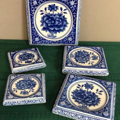 Lot #106 5 plant stand or trivets?  Blue Transferware