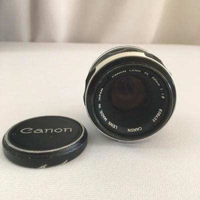 Lot 19 - Vintage Canon Camera, Lens and Case