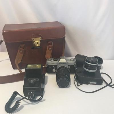 Lot 19 - Vintage Canon Camera, Lens and Case
