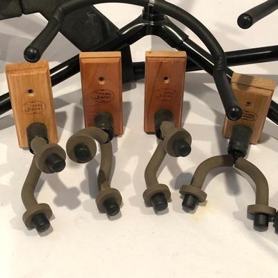 Lot 75- 4 Guitar Stands and Wall Hooks