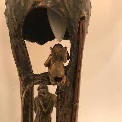 Lot 161 - Brass Lamp with Monk and Cherub